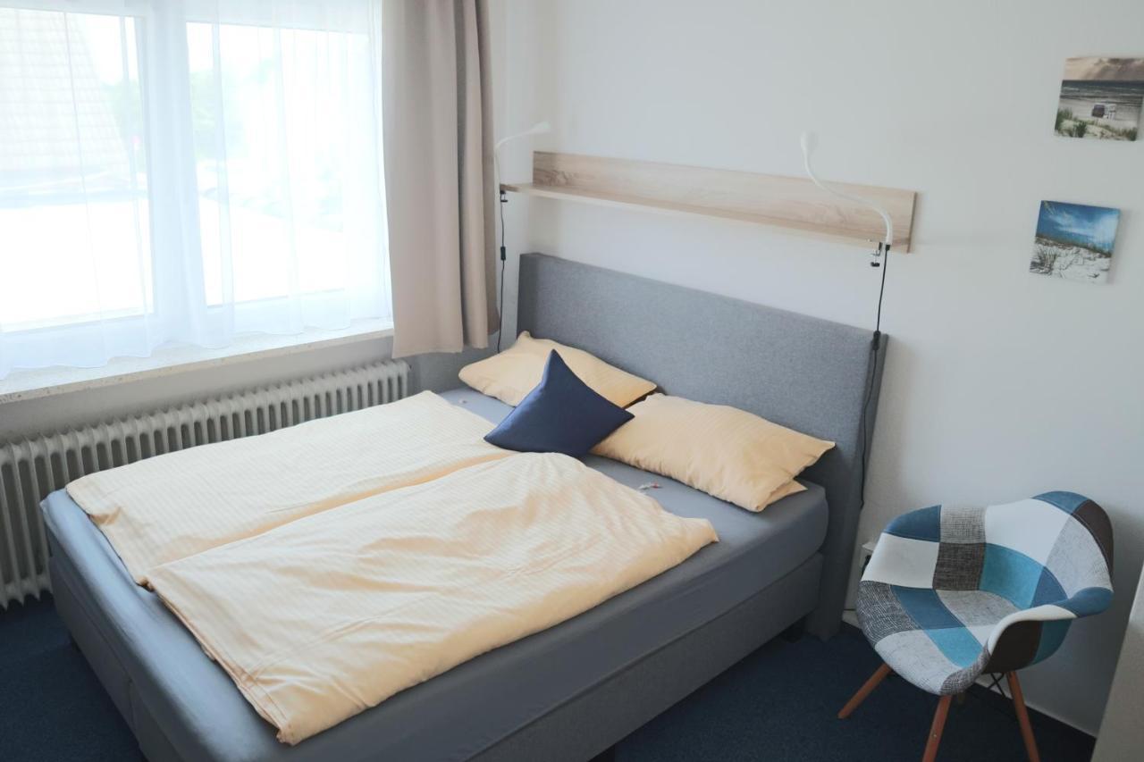 Hotel Am Friesenstrand Tossens Buitenkant foto