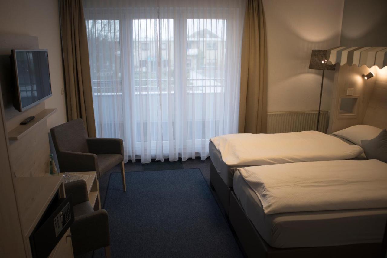 Hotel Am Friesenstrand Tossens Buitenkant foto
