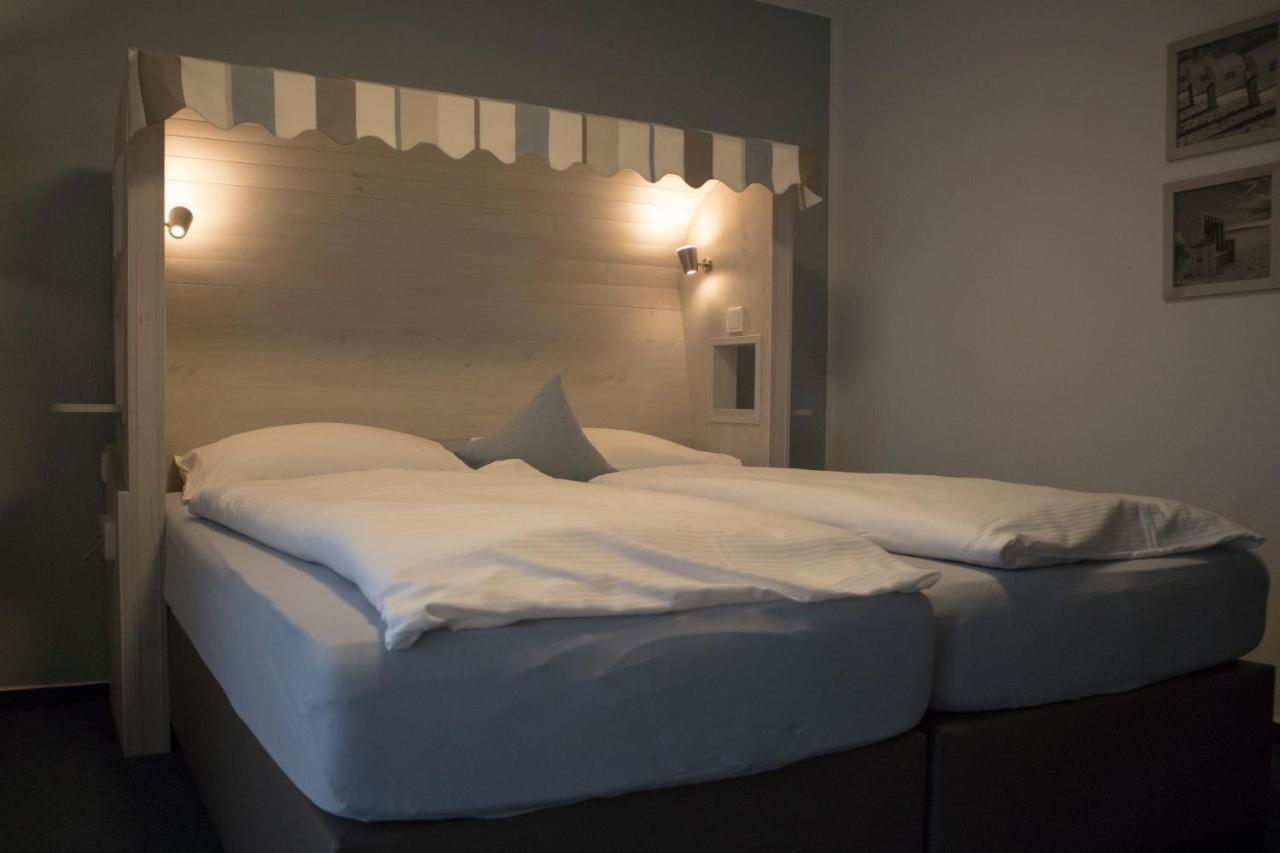 Hotel Am Friesenstrand Tossens Buitenkant foto