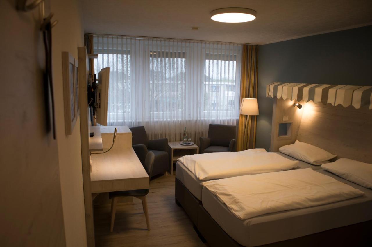 Hotel Am Friesenstrand Tossens Buitenkant foto