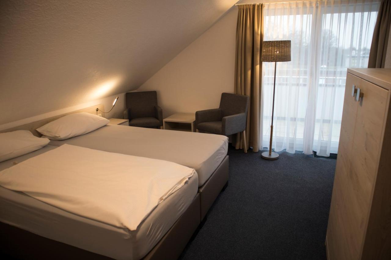 Hotel Am Friesenstrand Tossens Buitenkant foto
