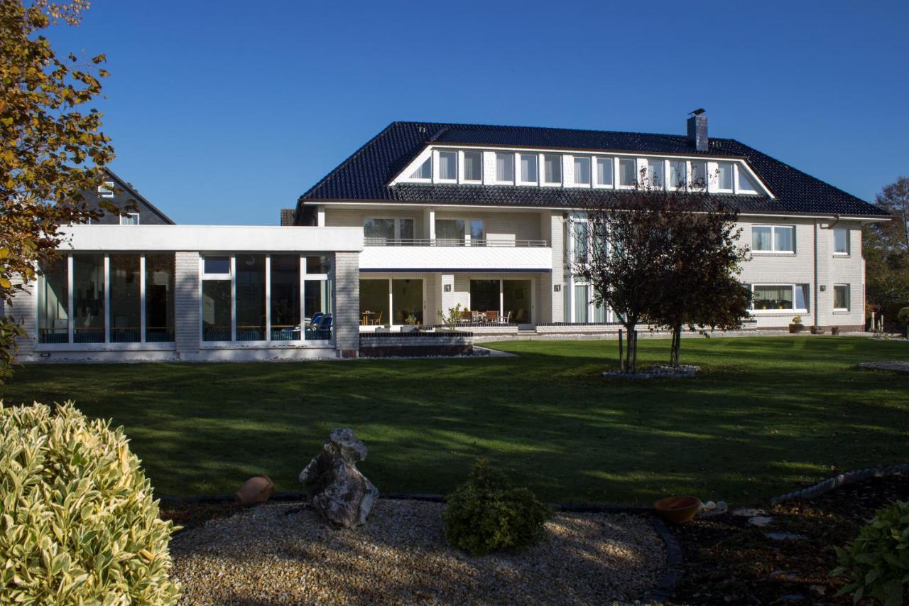 Hotel Am Friesenstrand Tossens Buitenkant foto